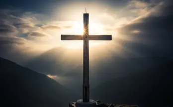 1 timothy chapter 2 outline is a picture fo the cross bwith a sun rising in the background.