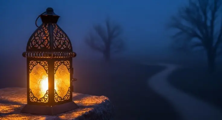 Lantern glowing in darkness symbolizing believers as lights in Philippians 2.