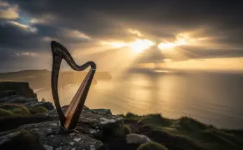 book of proverbs bible outline. A harp sitting on a cliff overlooking a sunrise over the ocean.